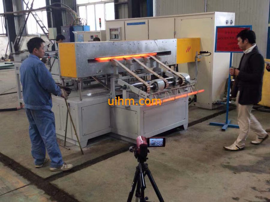 auto feeding system for induction forging steel rods